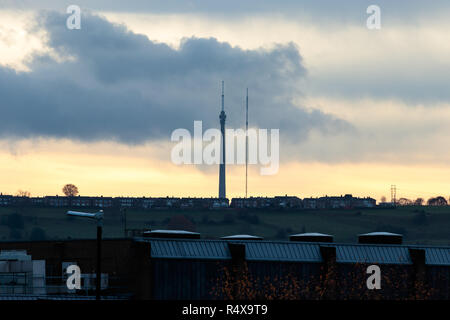 Emley Moor TV broadcast mast, and it's temporary replacement, as seen from Dewsbury town centre Stock Photo