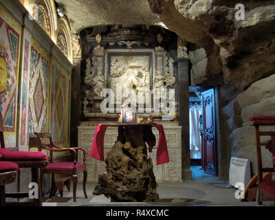 The Cave of Saint Ignatius, with white marble low relief in the Collegiate Basilica of Holy Mary in Manresa, Catalonia, Spain Stock Photo