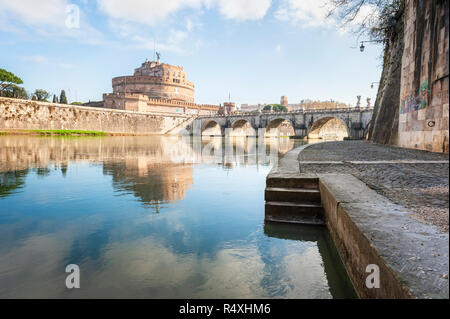View of Castel Sant' Angelo and Ponte Sant' Angelo from the banks of the River Tiber in Rome Stock Photo