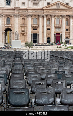 Rows of empty seats - part of temporary seating in an almost deserted St Peter's Square in the Vatican Rome Stock Photo
