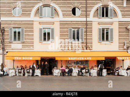 Dining alfresco, Diners and italian waiters at tables outside  the Restaurant Canova in Piazza del Popolo Rome Stock Photo