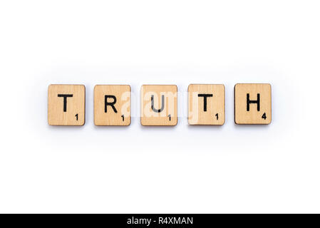 LONDON, UK - JULY 5TH 2018: The word TRUTH, spelt with wooden letter Scrabble tiles, on 5th July 2018. Stock Photo
