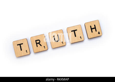 LONDON, UK - JULY 5TH 2018: The word TRUTH, spelt with wooden letter Scrabble tiles, on 5th July 2018. Stock Photo