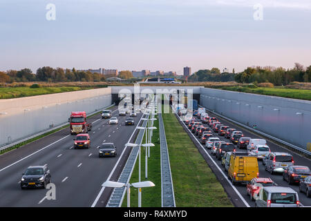 A4 deepened motorway Rotterdam- The Hague, traffic jam in the direction of Rotterdam. Stock Photo