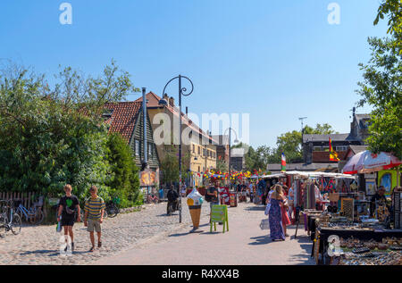 Market stalls on Pusher Street in Freetown Christiania, a commune in Christianshavn, Copenhagen, Denmark Stock Photo