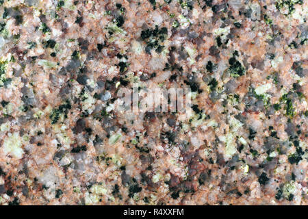 Texture of the polished surface of Herefoss granite, macro shot Stock Photo