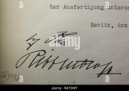 Signatures of Adolf Hitler and Joachim von Ribbentrop under the Hácha Hitler Protocol on display at the Czech-Slovak Exhibition (Česko-slovenská výstava) in the National Museum (Národní muzeum) in Prague, Czech Republic. The document signed in Berlin on 15 March 1939 by the President of Czechoslovakia Emil Hácha and the Minister of Foreign Affairs of Czechoslovakia František Chvalkovský put the territory and population of Bohemia and Moravia under the protection of the German Reich and ensured that the occupation of the Czech territory would not be resisted by the local people and military. On Stock Photo