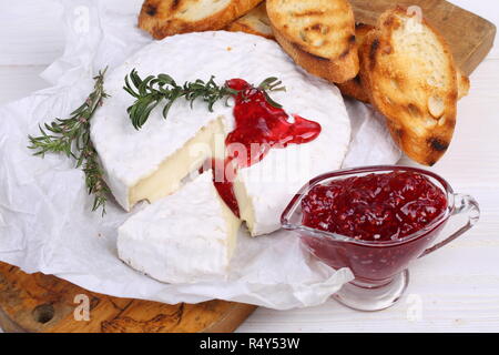 Camembert with raspberry confiture Stock Photo