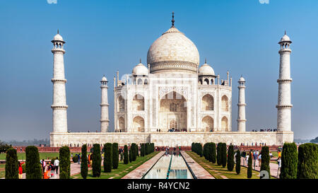 Agra, India - Nov 21, 2018: Tourists visiting Taj Mahal build in 17th century by Moghul Emperor Shah Jehan in memory of his beloved wife Mumtaz Mahal. Stock Photo