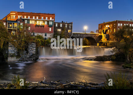 Charming downtown Middlebury village and Otter Creek at dusk, Vermont, USA. Stock Photo