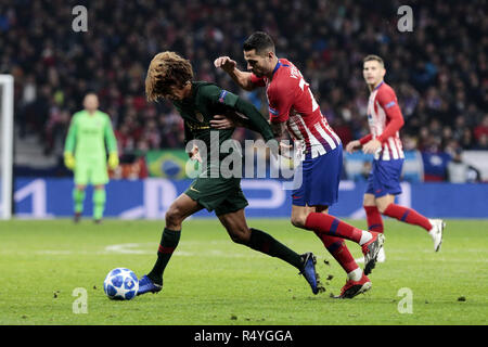 Madrid, Madrid, Spain. 28th Nov, 2018. Atletico de Madrid's Victor Machin 'Vitolo' and AS Monaco's Han-Noah Massengo are seen in action during the UEFA Champions League match between Atletico de Madrid and AS Monaco at the Wanda Metropolitano Stadium in Madrid. Credit: Legan P. Mace/SOPA Images/ZUMA Wire/Alamy Live News Stock Photo