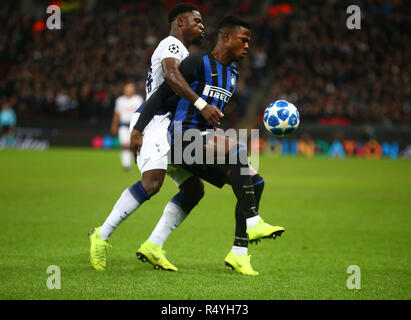 London, England - November 28, 2018 Keita Balde of Inter Milan  holds of Tottenham Hotspur's Serge Aurier during Champion League Group B between Tottenham Hotspur and Inter Milan at Wembley stadium , London, England on 28 Nov 2018. Credit Action Foto Sport  FA Premier League and Football League images are subject to DataCo Licence. Editorial use ONLY. No print sales. No personal use sales. NO UNPAID USE Credit: Action Foto Sport/Alamy Live News Stock Photo