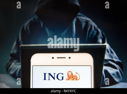 Hong Kong, China. 23rd Nov, 2018. Dutch multinational banking and financial services company ING Group logo is seen on an Android mobile device with a figure of hacker in the background. Credit: Miguel Candela/SOPA Images/ZUMA Wire/Alamy Live News Stock Photo