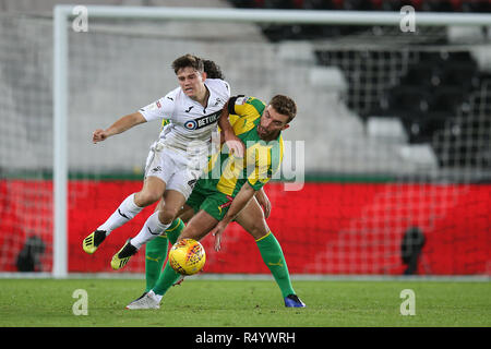 Swansea, Wales, UK. 28th November, 2018. Daniel James of Swansea city is fouled by James Morrison of West Bromwich Albion ¨. EFL Skybet championship match, Swansea city v West Bromwich Albion at the Liberty Stadium in Swansea, South Wales on Wednesday 28th November 2018.  this image may only be used for Editorial purposes. Editorial use only, license required for commercial use. No use in betting, games or a single club/league/player publications. pic by Andrew Orchard/Andrew Orchard sports photography/Alamy Live news Stock Photo