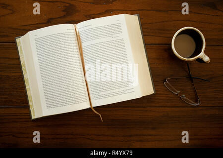 open book with glasses and coffee Stock Photo