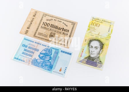 Hyperinflation - the 3 classic cases: Germany 1920s (100 Billion Marks), Zimbabwe Dollar (100 Trillion, 2008), Venezuelan 100,000 Bolivar banknote. Stock Photo