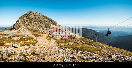 Mount Chopok in Low Tatras National Park with Mountain Hut and Cableway Stock Photo