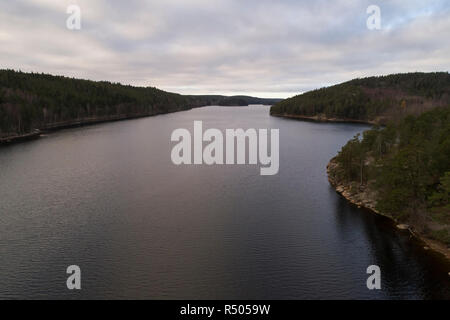 Beautiful landscape at Agelsjon, Norrkoping, Sweden, Scandinavia. Lovely nature on autumn day. Nice outdoors photo shot with drone in sky from above. Stock Photo