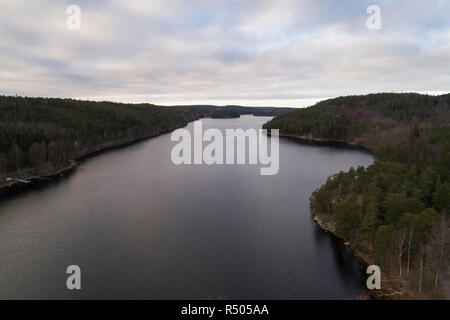 Beautiful landscape at Agelsjon, Norrkoping, Sweden, Scandinavia. Lovely nature on autumn day. Nice outdoors photo shot with drone in sky from above. Stock Photo