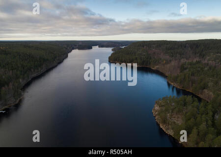 Beautiful landscape at Agelsjon, Norrkoping, Sweden, Scandinavia. Lovely nature on autumn day. Nice outdoors photo shot with drone in sky from above.