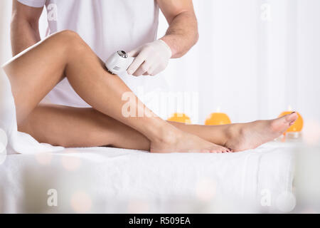 Woman Having Ultrasound Anti Wrinkle Treatment At Beauty Clinic Stock Photo