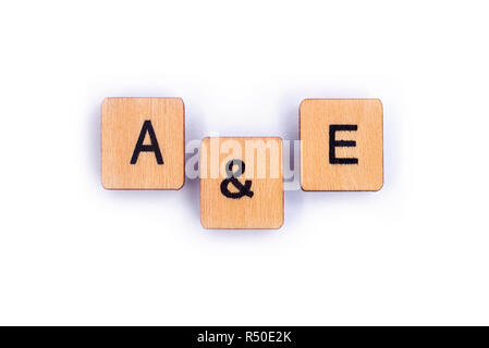 The abbreviation A&E - Accident & Emergency, spelt with wooden letter tiles. Stock Photo