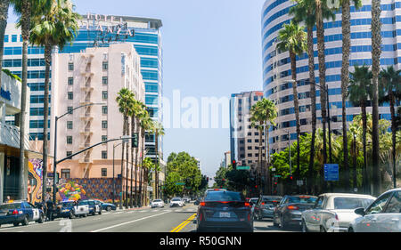 August 17, 2018 San Jose / CA / USA - Busy street lined up with tall buildings in downtown San Jose on a sunny day, Silicon Valley Stock Photo