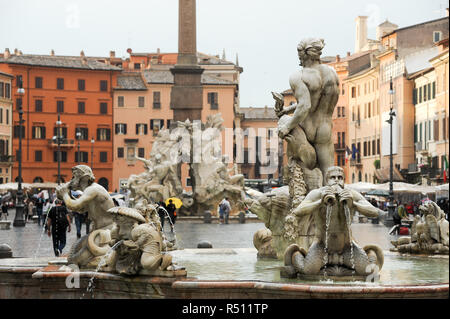 Baroque Fontana del Moro (Moor Fountain) and Baroque  Fontana dei Quattro Fiumi (Fountain of the Four Rivers) designed by Gian Lorenzo Bernini on Piaz Stock Photo