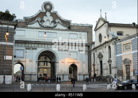 Porta del Popolo gate in Aurelian Walls and Renaissance and Baroque Basilica Santa Maria del Popolo (Basilica of Santa Maria del Popolo) on Piazza del Stock Photo