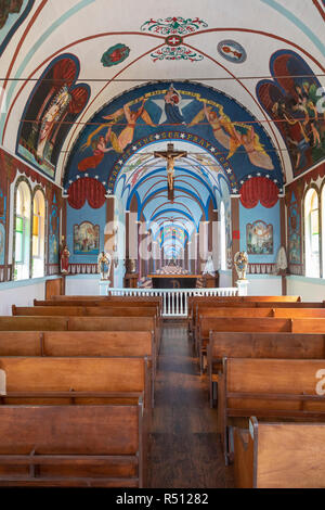 Kalapana, Hawaii - Star of the Sea Painted Church. Built in 1927-28, the church was moved in 1990 to escape a lava flow from the Kilauea volcano. Stock Photo