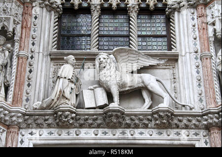 Symbolic winged lion sculpture at the Doges Palace in Venice Stock Photo