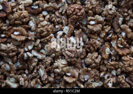 Raw walnut kernels texture abstract background Stock Photo