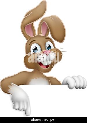 Easter Bunny Rabbit Pointing Cartoon at Sign Stock Vector