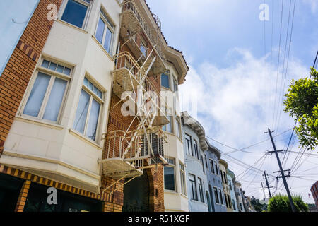 Street view of rows of multi unit buildings  in one of the San Francisco's residential neighborhoods, California Stock Photo
