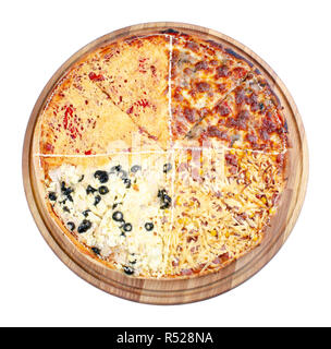 quadruple topping family pizza on the wooden desk isolated. view from the top. sausage vs pork and corn vs mushrooms vs olives, in different kind of c Stock Photo