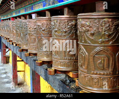 stringed prayer wheels Stock Photo