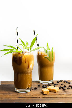 Mocha coffee with marijuana in a high drinking glass Stock Photo