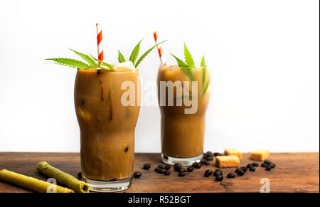 Mocha coffee with marijuana in a high drinking glass Stock Photo