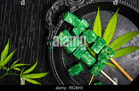 Marijuana cannabis leaves dessert snack on a stick Stock Photo