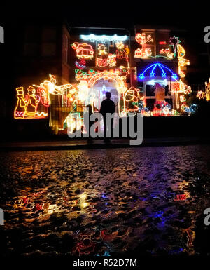 A house in Gateshead is lit up with Christmas lights, it is the 21st year the family have been putting up lights and add new lights every year. Stock Photo