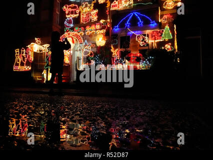 A house in Gateshead is lit up with Christmas lights, it is the 21st year the family have been putting up lights and add new lights every year. Stock Photo