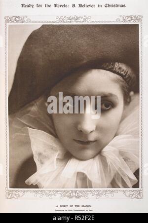 'Ready for the revels: A believer in Christmas'. 'A spirit of the season'. Stacia Napierkowska (16 September 1891 â€“ 11 May 1945) was a French actress and dancer, who worked during the silent film era. Photograph by 'Bert'. The Sketch. London, 1913. Source: The Sketch, Christmas 1913, page 23. Stock Photo