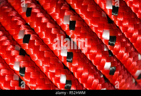 Extreme close up of new colourful red nylon rope Stock Photo