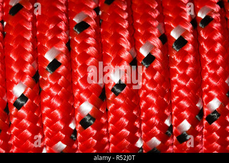 Extreme close up of new colourful red nylon rope Stock Photo