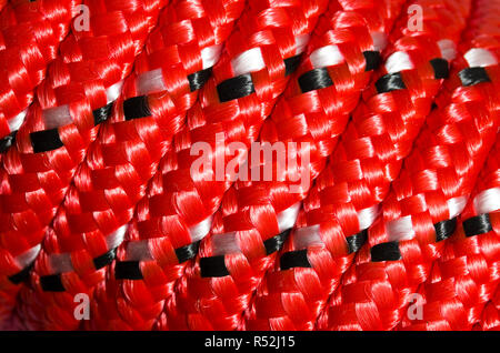 Extreme close up of new colourful red nylon rope Stock Photo