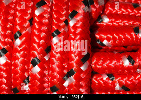 Extreme close up of new colourful red nylon rope Stock Photo