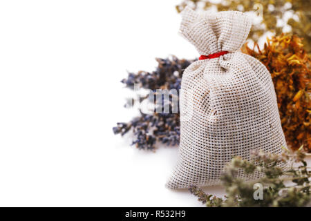 Aromatic herbs in a bag on white background with copy space Stock Photo