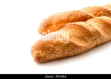 Two fresh baguettes with sesame isolated on white background Stock Photo