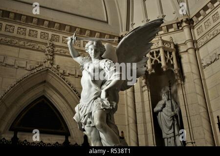 A beautiful marble statue of Saint Michael the Archangel in the foyer of Saint Peter's Seminary, London, Ontario, Canada. Stock Photo