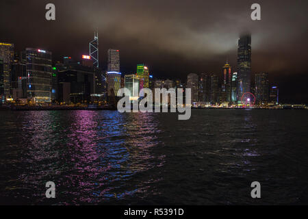 Hong Kong Central night cityscape viewed from Golden Bauhinia Square near Hong Kong Convention and Exhibition Centre, Hong Kong, Wan Chai Stock Photo
